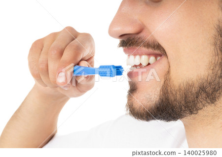 Man promotes hygiene with a toothbrush, isolated, PNG 140025980