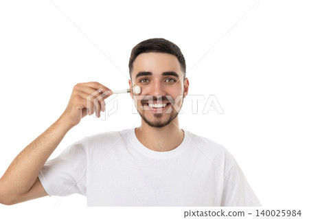 Man enjoys a refreshing skin care moment using a roller, isolated, PNG Man enjoys a refreshing skin care moment using a roller, isolated, PNG 140025984