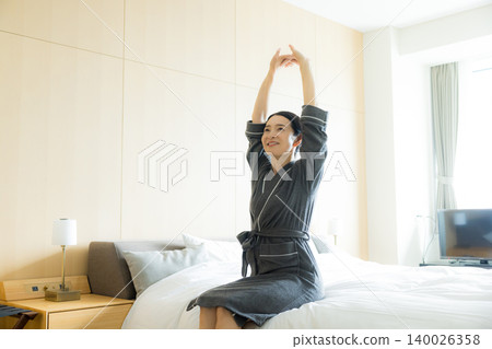 Middle-aged woman in a bathrobe Middle-aged woman in a bathrobe 140026358