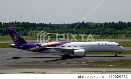 Thai Airways passenger plane and Narita Airport runway Thai Airways passenger plane and Narita Airport runway 140026782