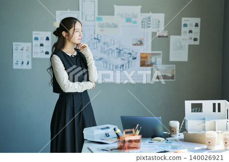 A woman working at a design firm A woman working at a design firm 140026921