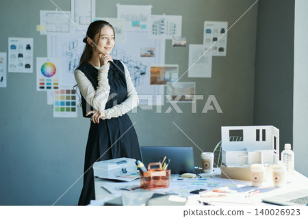 A woman working at a design firm A woman working at a design firm 140026923