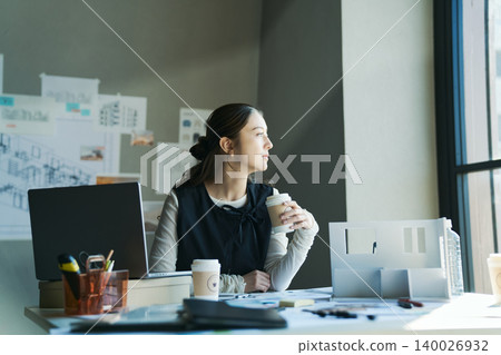 A woman working at a design firm A woman working at a design firm 140026932