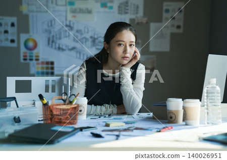 A woman working at a design firm A woman working at a design firm 140026951