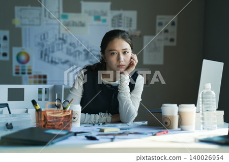 A woman working at a design firm A woman working at a design firm 140026954