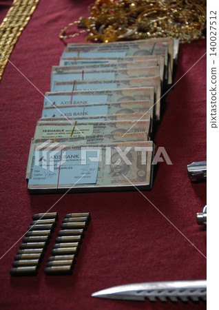Indian Currency on the table Indian Currency on the table 140027512