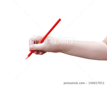 One hand is holding a red wooden pencil against a white background. 140027651