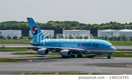 Korean Air passenger plane and Narita Airport runway Korean Air passenger plane and Narita Airport runway 140028765