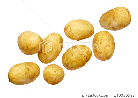 Set of young potatoes flying on a white background. Isolated Set of young potatoes flying on a white background. Isolated 140030585