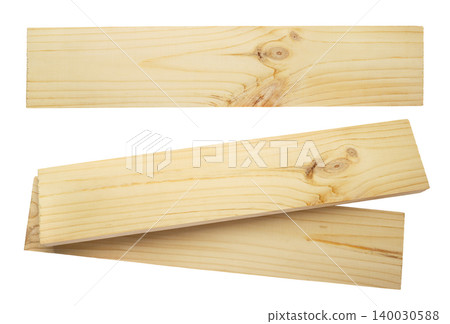 Set of wooden boards cut out on a white background. Edged boards top view Set of wooden boards cut out on a white background. Edged boards top view 140030588
