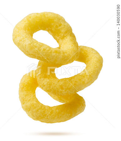 Corn rings flying close-up on a white. Isolated Corn rings flying close-up on a white. Isolated 140030590