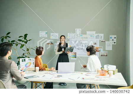 Female designer proposing ideas Female designer proposing ideas 140030742