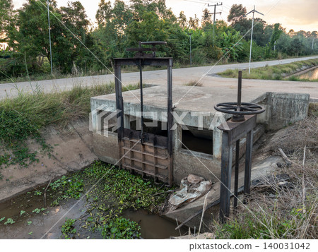 Irrigation Canal Sluice Gate in Rural Area Irrigation Canal Sluice Gate in Rural Area 140031042