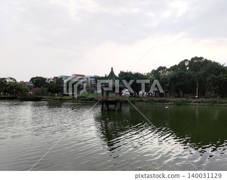 Taipei, Taiwan - 04.06.2026: There is a pavilion in the center of Zuiyue Lake on the main campus of National Taiwan University (NTU) in Da'an District. Taipei, Taiwan - 04.06.2026: There is a pavilion in the center of Zuiyue Lake on the main campus of National Taiwan University (NTU) in Da'an District. 140031129