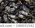 Salted Rice Field Crabs For Sale At A Fresh Food Market. Close up of preserved crabs in a pile at a local asian market, perfect for traditional cuisine, street food and seafood industry themes. 140031542