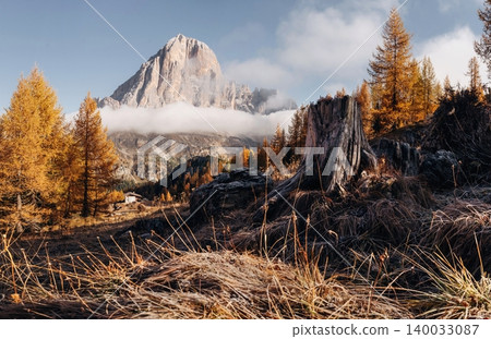 Great autumn view of the top Tofana di Rozes range in Dolomites, South Tyrol. Location Cortina d'Ampezzo, Italy, Europe. Beauty of mountains world. Great autumn view of the top Tofana di Rozes range in Dolomites, South Tyrol. Location Cortina d'Ampezzo, Italy, Europe. Beauty of mountains world. 140033087