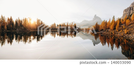 Crystal clear water. Panorama of Lake Federa near the Croda da Lago mountain at autumn time, majestic landscape, raw nature 140033090