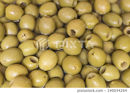 Green pitted olives in marinade Green pitted olives in marinade 140034264