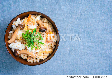 Photo of Japanese-style mixed rice with sea bream, mushrooms, and perilla leaves. Photo of Japanese-style mixed rice with sea bream, mushrooms, and perilla leaves. 140034546