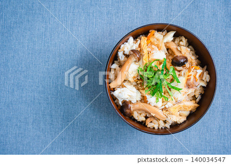 Photo of Japanese-style mixed rice with sea bream, mushrooms, and perilla leaves. Photo of Japanese-style mixed rice with sea bream, mushrooms, and perilla leaves. 140034547