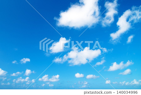 blue sky background with tiny clouds blue sky background with tiny clouds 140034996