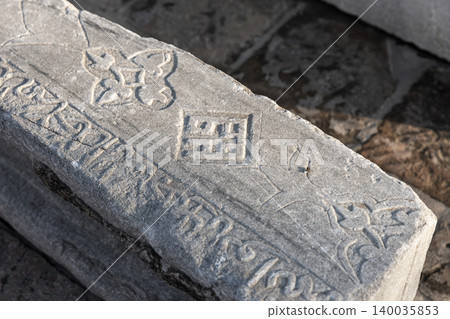 Close-up view of a weathered stone carving Close-up view of a weathered stone carving 140035853