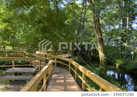 Wooden Boardwalk Along a Stream in Passadicos do Rio Uima Wooden Boardwalk Along a Stream in Passadicos do Rio Uima 140037280