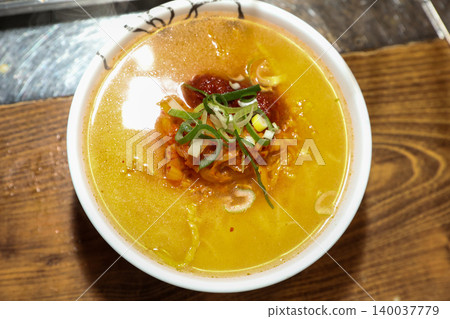 Bowl of Spicy Corn Noodle Soup at Asian Barbecue Restaurant Bowl of Spicy Corn Noodle Soup at Asian Barbecue Restaurant 140037779