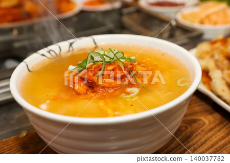 Bowl of Spicy Corn Noodle Soup at Asian Barbecue Restaurant Bowl of Spicy Corn Noodle Soup at Asian Barbecue Restaurant 140037782
