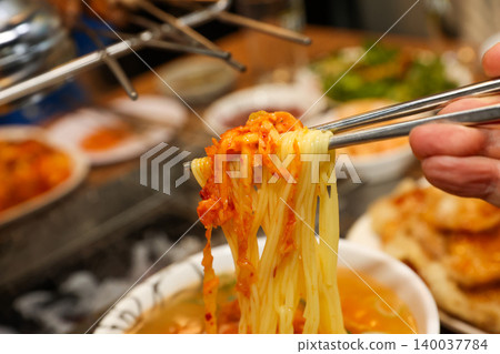 Bowl of Spicy Corn Noodle Soup at Asian Barbecue Restaurant Bowl of Spicy Corn Noodle Soup at Asian Barbecue Restaurant 140037784