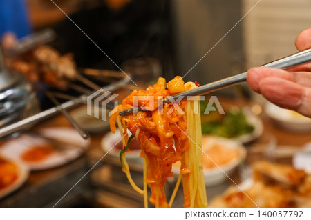 Bowl of Spicy Corn Noodle Soup at Asian Barbecue Restaurant Bowl of Spicy Corn Noodle Soup at Asian Barbecue Restaurant 140037792