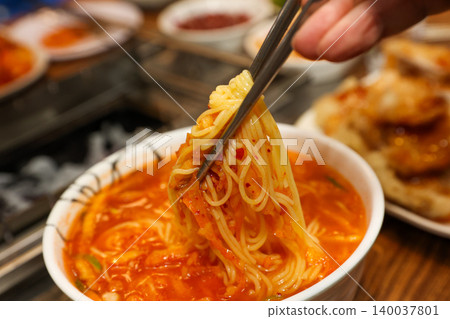 Bowl of Spicy Corn Noodle Soup at Asian Barbecue Restaurant Bowl of Spicy Corn Noodle Soup at Asian Barbecue Restaurant 140037801