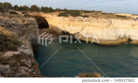 High Angle View of Sea Cave and Coastal Limestone Cliffs in Algarve Portugal 140037982