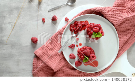 Top View of Raspberry Chia Pudding with Fresh Mint and Berries Top View of Raspberry Chia Pudding with Fresh Mint and Berries 140038173
