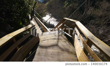 Wooden Boardwalk and Stairs Overlooking a Scenic River Gorge Wooden Boardwalk and Stairs Overlooking a Scenic River Gorge 140038174