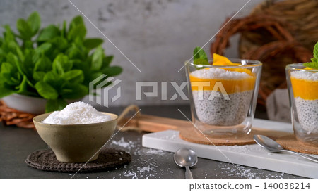 Vegan Chia Seed Pudding with Mango Puree and Shredded Coconut Vegan Chia Seed Pudding with Mango Puree and Shredded Coconut 140038214