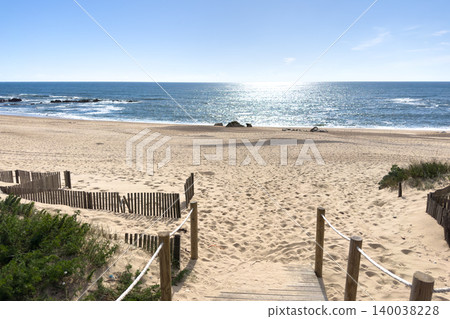 Scenic Entrance to Miramar Beach with Sand Dunes and Sparkling Atlantic Ocean in Gaia Portugal Scenic Entrance to Miramar Beach with Sand Dunes and Sparkling Atlantic Ocean in Gaia Portugal 140038228