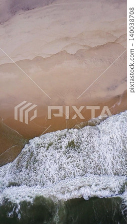 Ocean waves crashing on beach Ocean waves crashing on beach 140038708