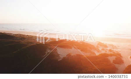 Aerial view of beach at sunset Aerial view of beach at sunset 140038731
