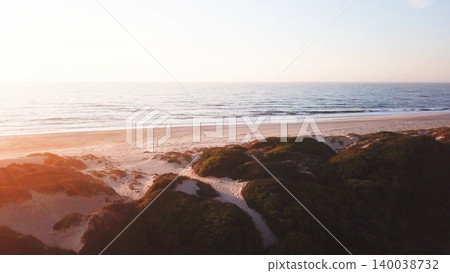 Aerial view of beach at sunset Aerial view of beach at sunset 140038732