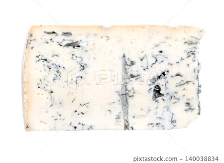 Slice of Gorgonzola Piccante, Italian blue cheese made from cow's milk, with soft and crumbly texture, and quite salty taste, with a so called bite from blue-green veining. Isolated from above. Photo Slice of Gorgonzola Piccante, Italian blue cheese made from cow's milk, with soft and crumbly texture, and quite salty taste, with a so called bite from blue-green veining. Isolated from above. Photo 140038834