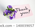 Thank you in handwritten letters and small flowers 140039057
