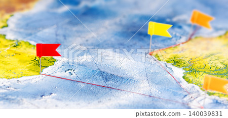 World map background with red and yellow location flags 140039831