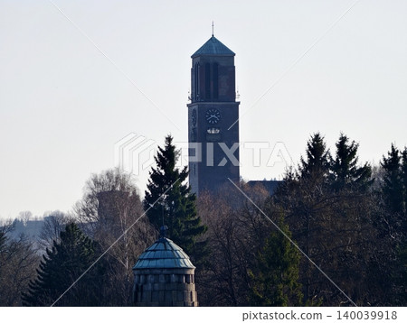 Skyline with Tower. Quiet landscape showcasing prominent masonry tower with natural surroundings 140039918