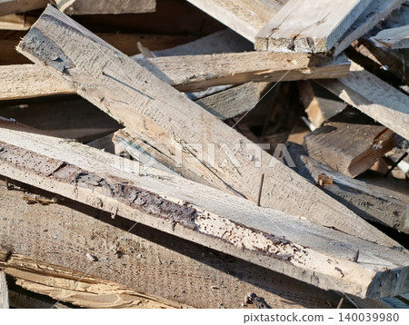 Weathered timber with nails and texture. Rough aged wooden boards with cracks and nail holes Weathered timber with nails and texture. Rough aged wooden boards with cracks and nail holes 140039980