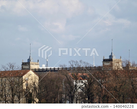 City skyline overview. Urban rooftop view with towers. Panoramic cityscape with distant horizon and structures City skyline overview. Urban rooftop view with towers. Panoramic cityscape with distant horizon and structures 140040228