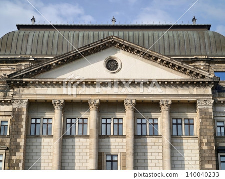 Grand civic entrance. Majestic colonnade featuring prominent triangular pediment and circular opening Grand civic entrance. Majestic colonnade featuring prominent triangular pediment and circular opening 140040233