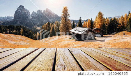 Wooden deck foreground of the top Tofana di Rozes and Cinque Torri range in Dolomites, South Tyrol. Location Cortina d'Ampezzo, Italy, Europe. Beauty of autumn and first frost snow on mountains world. Wooden deck foreground of the top Tofana di Rozes and Cinque Torri range in Dolomites, South Tyrol. Location Cortina d'Ampezzo, Italy, Europe. Beauty of autumn and first frost snow on mountains world. 140040265