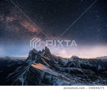 Seceda mountain, winter night scene of majestic nature, beautiful touristic place. Starry sky and milky way and galaxy landscape Seceda mountain, winter night scene of majestic nature, beautiful touristic place. Starry sky and milky way and galaxy landscape 140040271