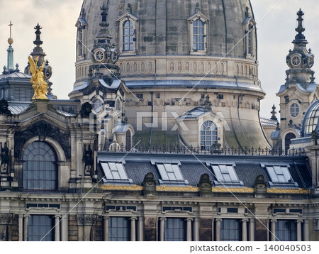 Textural examination of ornate rooftop with sculptural elements showing age and craftsmanship 140040503